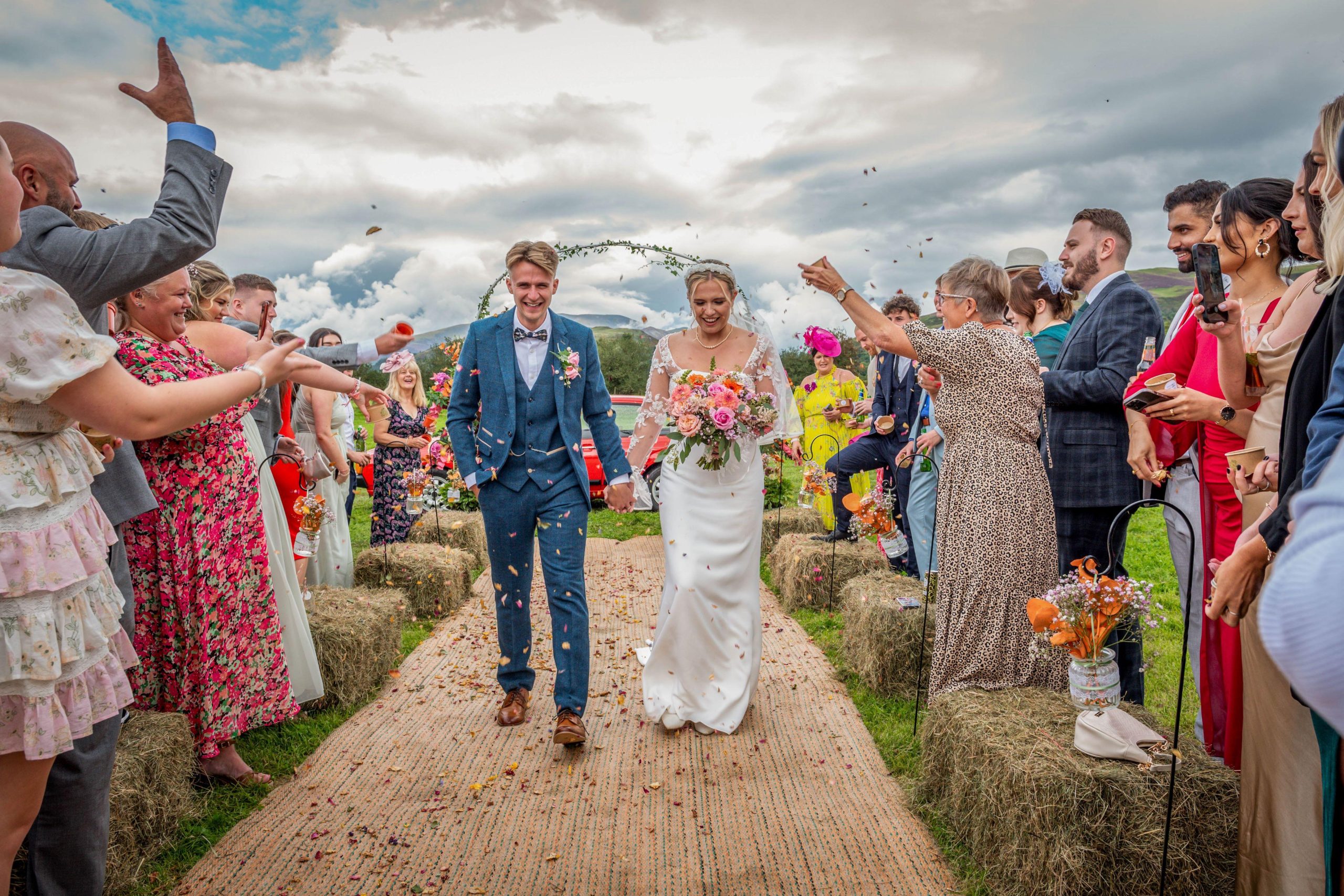 Tipi wedding with bridesmaids under Nordic tipi frame